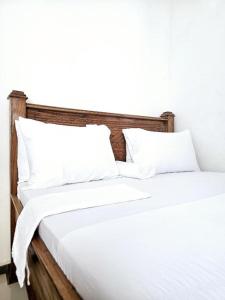 Postel nebo postele na pokoji v ubytování Hello Rafiki GuestHouse - Mkunazini
