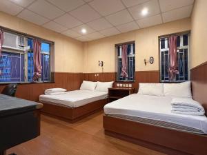 Krevet ili kreveti u jedinici u okviru objekta Wee Classic Inn