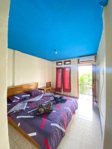 Postel nebo postele na pokoji v ubytování Pieter homestay