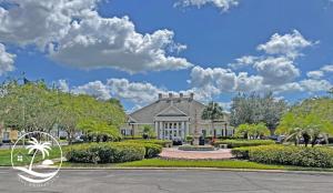 a house with a landscaping in front of it at Villas at Seven Dwarfs - Close to Disney in Kissimmee