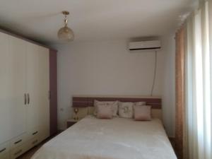 Postel nebo postele na pokoji v ubytování Villa Miceli