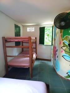 Postel nebo postele na pokoji v ubytování Covil das Trilhas + 29 fotografií