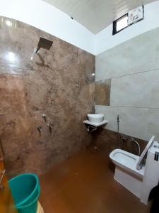 Koupelna v ubytování Hotel Mahadev Kripa