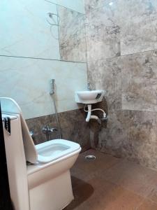 Koupelna v ubytování Hotel Mahadev Kripa