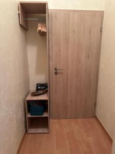 a door leading into a room with a table at Ferienhaus Löwenherz in Pommern +201 photos