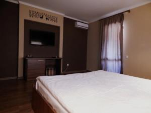 מיטה או מיטות בחדר ב-Recreation complex Volnogora