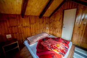 Φωτογραφία από το άλμπουμ του Manali Calling Cafe, wooden huts and hostel σε Bashist