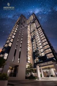 a tall building at night with a starry sky at Exclusive High Floor 2 Bed Room Sea View Luxury in Pattaya South