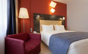 Postel nebo postele na pokoji v ubytování Hotel Alif Avenidas