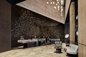 Gambar di galeri bagi Hilton Shanghai Zhangjiang Science City - Shuttle bus to Shanghai Disney Resort and Shanghai New International Expo Centre during exhibition period and 30 minutes drive to PVG di Shanghai