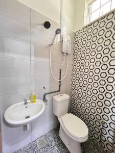Koupelna v ubytování Homestay Taman Sari Unit D, Kota Bharu
