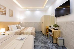 TV a/nebo společenská místnost v ubytování Nghia Lan Hotel