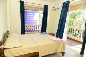 Postel nebo postele na pokoji v ubytování Dona Rosa Holiday Apartment + 37 fotografií
