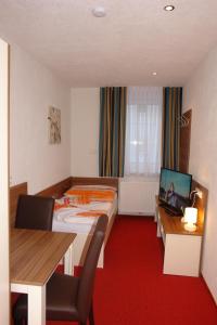 Hotel Garni Daniela Urich客房内的一张或多张床位
