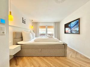 Ένα ή περισσότερα κρεβάτια σε δωμάτιο στο Loft am See I Balkon I Bergnähe I Parken I Schloss