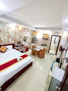 Postel nebo postele na pokoji v ubytování Đức Anh HoTel Vũng Tàu