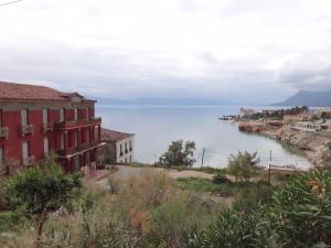 a view of the ocean from the town at 9 Queens Spa Hotel in Loutra Edipsou