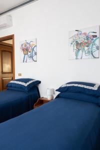 Postel nebo postele na pokoji v ubytování B&B Villa Dei Desideri