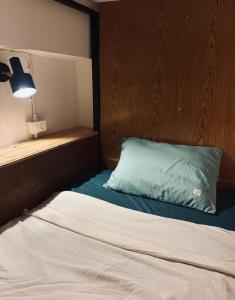 Postel nebo postele na pokoji v ubytování Happiness Hostel