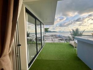 Balkón nebo terasa v ubytování South Beach Inn