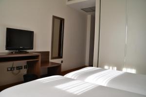 TV a/nebo společenská místnost v ubytování Hotel Pago del Olivo