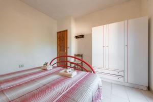 Postel nebo postele na pokoji v ubytování Bilo Grosseto