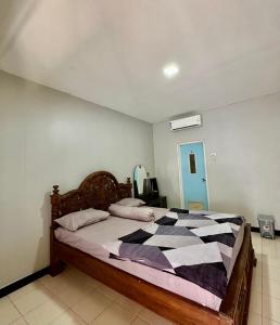 Katil atau katil-katil dalam bilik di Homestay JS LAUT