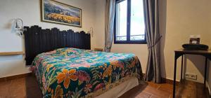 Ένα ή περισσότερα κρεβάτια σε δωμάτιο στο Villa Tropez Chambres d'hôtes +11 φωτογραφίες