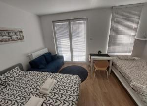 Posteľ alebo postele v izbe v ubytovaní Życzliwy Apartament z garażem