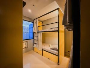 Letto o letti in una camera di Goofy Ants Hostel