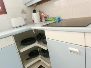Η κουζίνα ή μικρή κουζίνα στο 0 Dream Room +4 φωτογραφίες