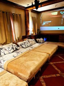 Family Room 1A Transient Baguio Parking Wifiにあるベッド