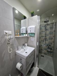 Koupelna v ubytování Rakoczi apartman 2