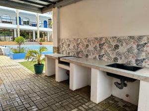 Fotografie z fotogalerie ubytování Aina Hannah Family Resort's Greek Unit v destinaci Calatagan