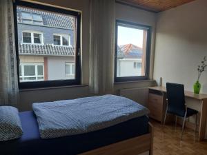 Ένα ή περισσότερα κρεβάτια σε δωμάτιο στο nice stay, 3 minutes to Kastel train station