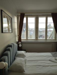 Katil atau katil-katil dalam bilik di Apartment for 6 person with Raekoja plats view