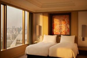 Ein Bett oder Betten in einem Zimmer der Unterkunft Banyan Tree Bangkok