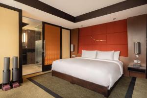 Ein Bett oder Betten in einem Zimmer der Unterkunft Banyan Tree Bangkok