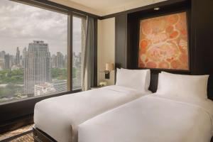 Ein Bett oder Betten in einem Zimmer der Unterkunft Banyan Tree Bangkok
