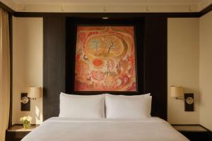 Ein Bett oder Betten in einem Zimmer der Unterkunft Banyan Tree Bangkok