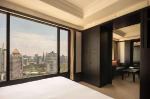 Ein Bett oder Betten in einem Zimmer der Unterkunft Banyan Tree Bangkok