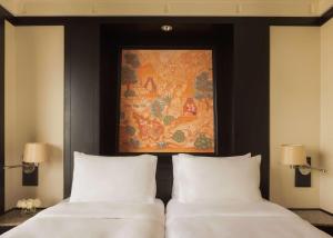 Ein Bett oder Betten in einem Zimmer der Unterkunft Banyan Tree Bangkok