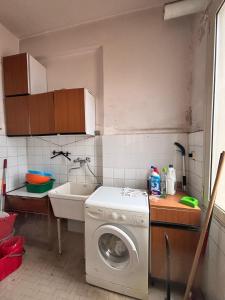Η κουζίνα ή μικρή κουζίνα στο Stanza in affitto Giarre +17 φωτογραφίες