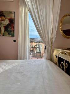 A bed or beds in a room at Relais Ristori