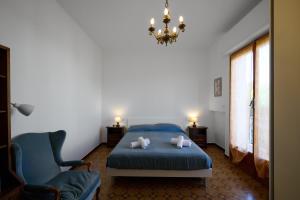 Ένα ή περισσότερα κρεβάτια σε δωμάτιο στο Villa Camilla Appartamento Terrazzo