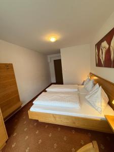 Voodi või voodid majutusasutuse Pension Plattenhof toas