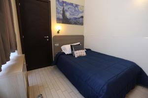Postel nebo postele na pokoji v ubytování Suite 39 B&B