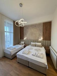 Letto o letti in una camera di Apostolovic Plus