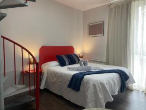 Łóżko lub łóżka w pokoju w obiekcie Casa de Huéspedes con encanto El Sueño del Quijote