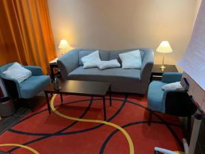 Predel za sedenje v nastanitvi Rich-Bridge Hotel